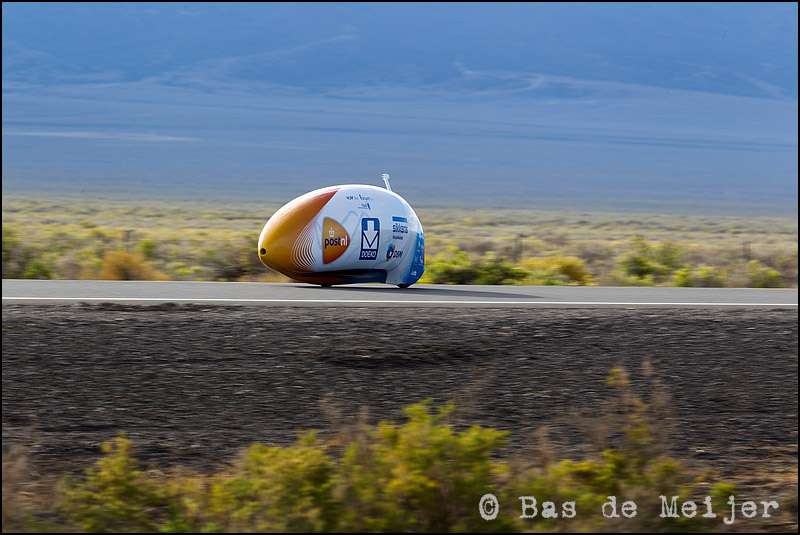 VeloX3 going all out at Battle Mountain 2013. Note the periscope housing the video camera that feeds a small screen providing the main view of the outside world. A conventional windscreen arrangement would create excess drag.